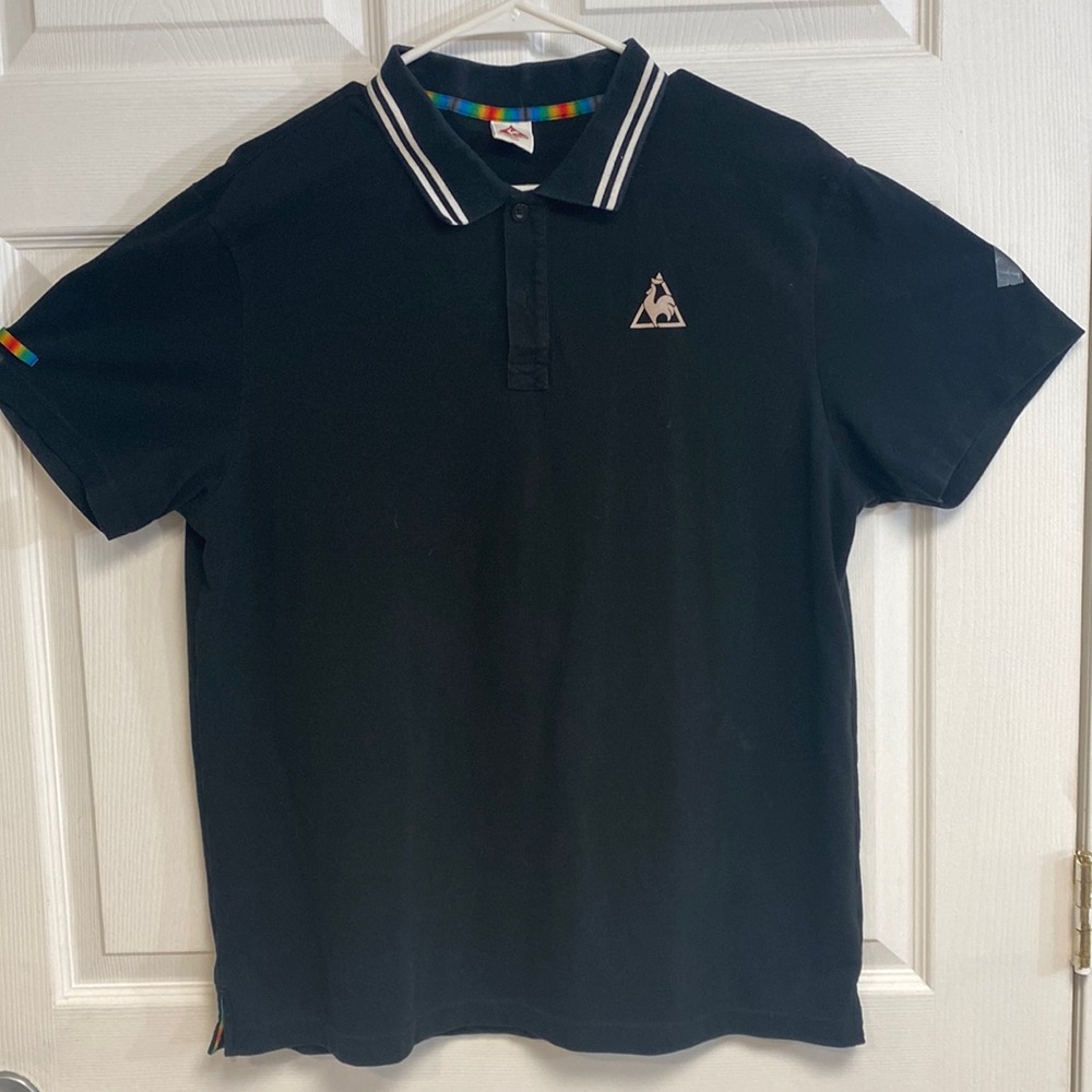 A black Le Coq Sportif Polo shirt